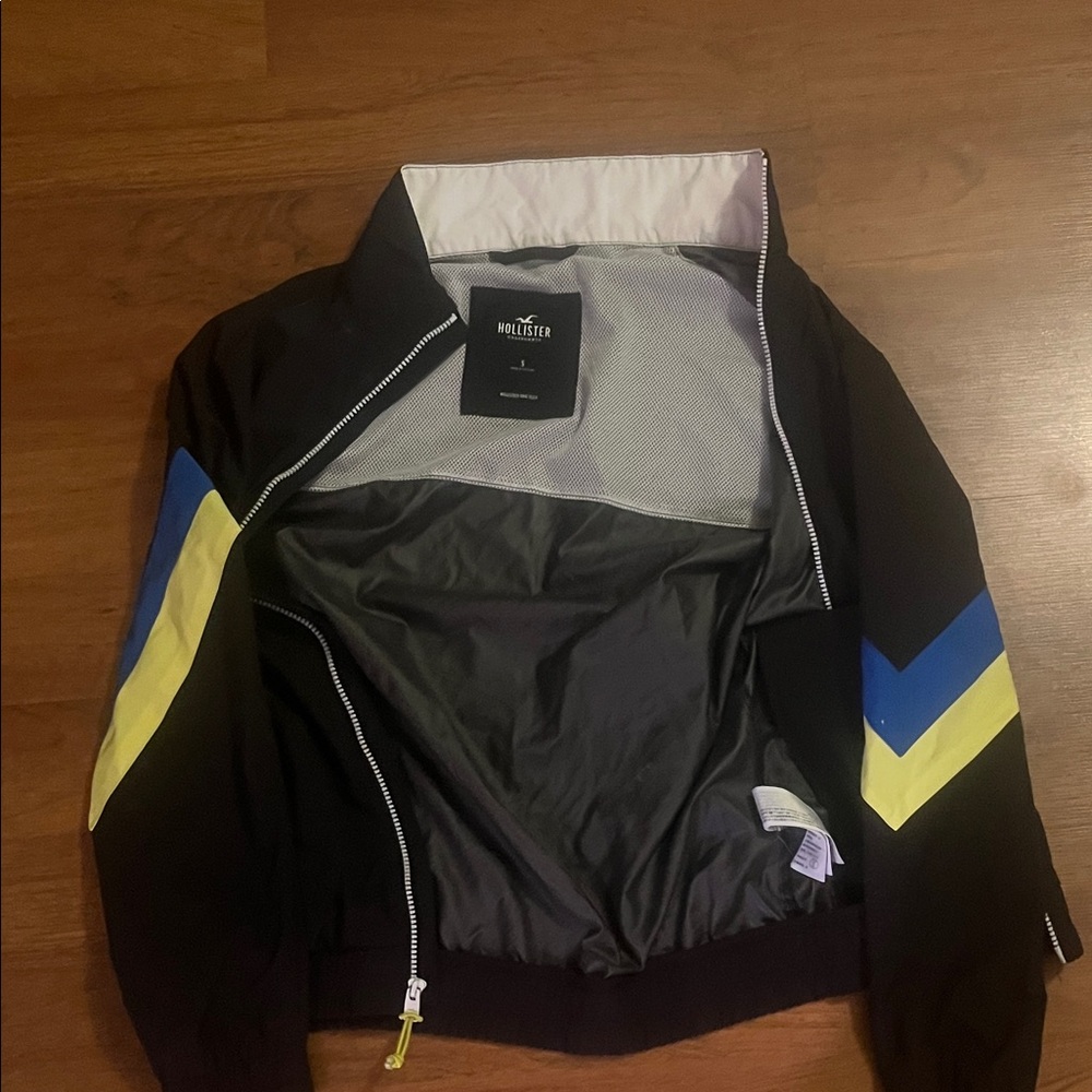 Hollister Black Jacket with Blue and Yellow Details